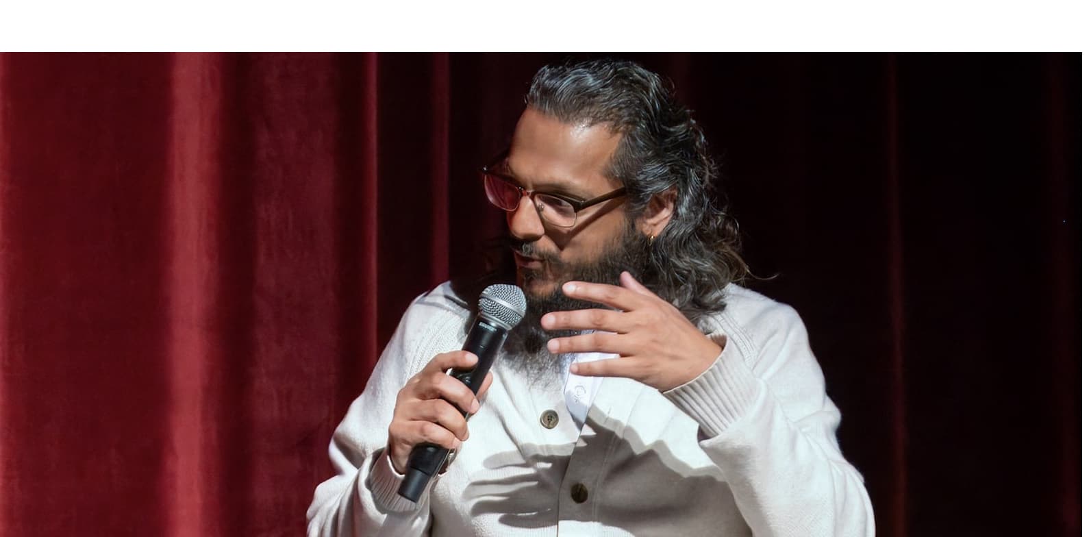 Vivek Gupta speaking at the Global Issues Summit